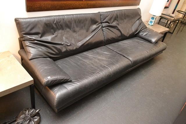 Appraisal: A BLACK LEATHER DESIGNER 'GOSH' SIX SEATER COUCH