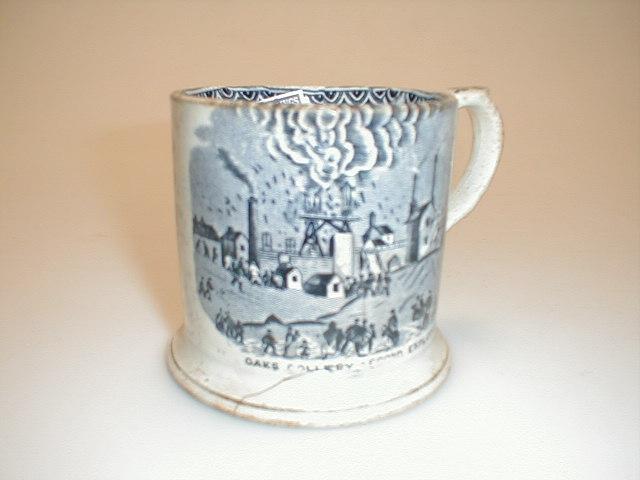 Appraisal: A rose pottery mug commemorating the mining disaster at the