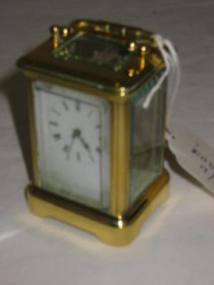 Appraisal: A MINIATURE FRENCH CARRIAGE CLOCK the single barrel movement with