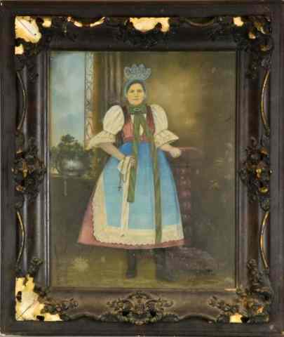 Appraisal: Photograph Of A Lady In Peasant DressAntique photograph highligted in