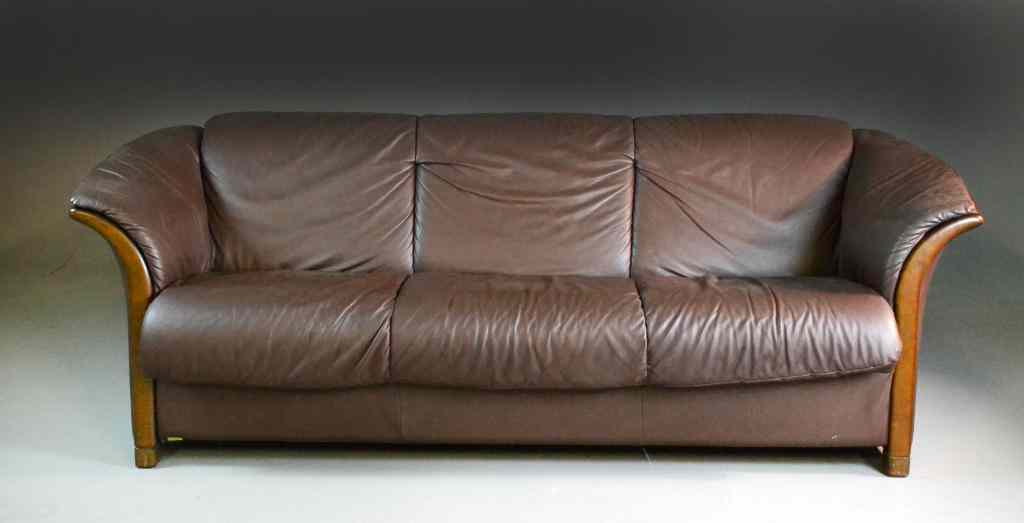 Appraisal: Brown Leather SofaContemporary sofa with wood trim '' H x