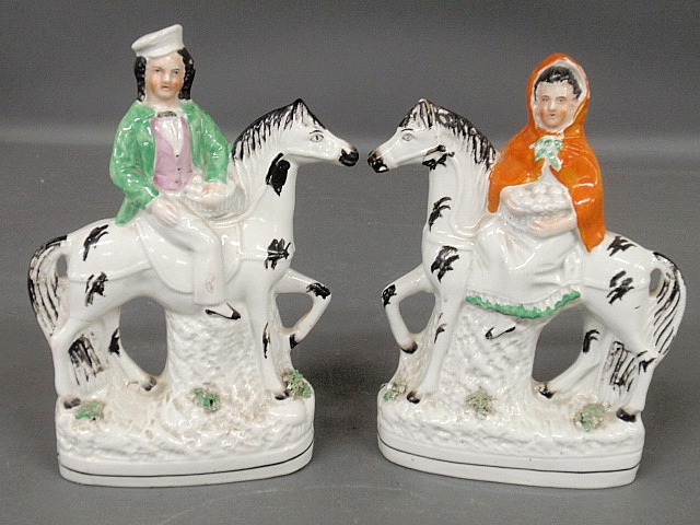 Appraisal: - Pair of Staffordshire equine figures c h x w