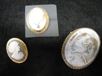 Appraisal: Group of three carved shell cameosOf graduating size two karat