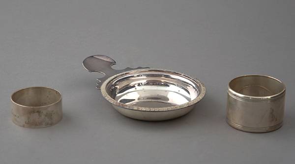 Appraisal: A group of sterling napkin rings bell pair of ashtrays