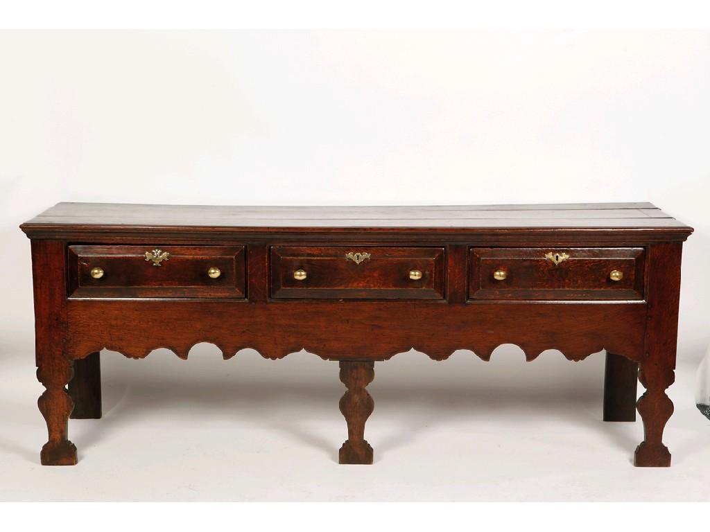 Appraisal: AN EARLY GEORGE III OAK DRESSER BASE the rectangular top