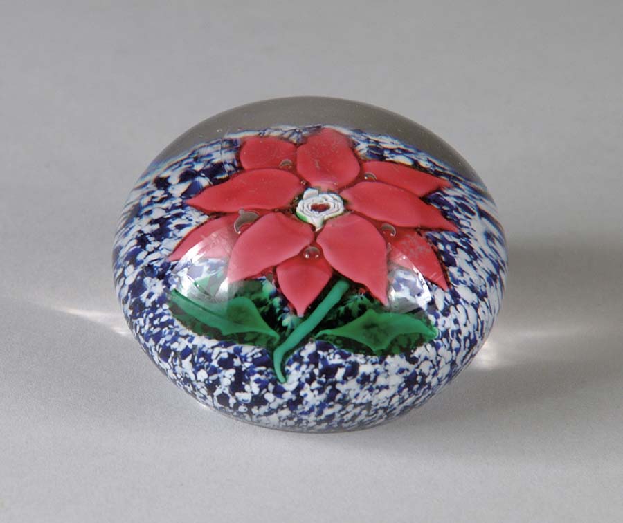 Appraisal: SANDWICH POINSETTIA PAPERWEIGHT Pink petal poinsettia blossom with green leaves