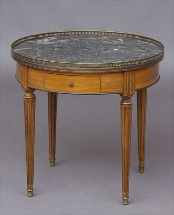 Appraisal: LOUIS XVI CARVED WALNUT BOULIOTTE TABLE The circular pierced gallery