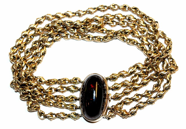 Appraisal: A FIVE ROW DOUBLE CHAIN LINK BRACELET with an oval