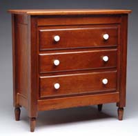 Appraisal: THREE DRAWER DOLL S CHEST The walnut chest has three