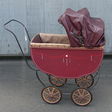 Appraisal: Carriage Burgundy wood doll carriage with adjustable hood Stenciled Art