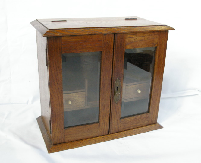 Appraisal: Diminutive Edwardian Bone-Mounted Oak and Beveled Glass Shaving Cabinet first