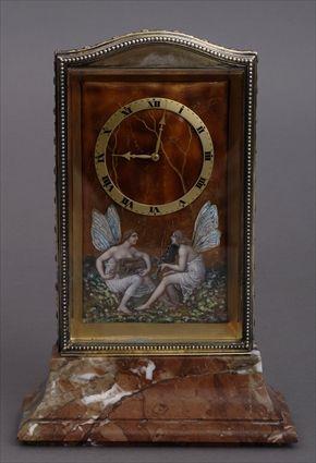 Appraisal: SWISS NEOCLASSICAL-STYLE ENAMEL AND SILVER-MOUNTED CLOCK Retailed by the Eterna