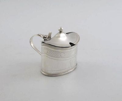 Appraisal: A George III mustard pot boat shaped with diaper border