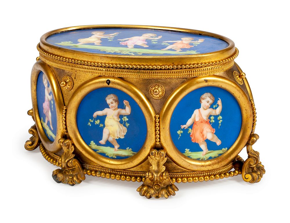 Appraisal: A French Porcelain Mounted Gilt Bronze Table Casket A French