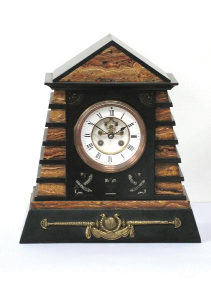 Appraisal: A VICTORIAN MARBLE AND POLISHED SLATE EGYPTIAN REVIVAL MANTEL CLOCK