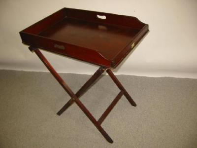 Appraisal: A VICTORIAN MAHOGANY BUTLERS TRAY ON STAND the oblong tray