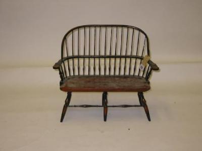 Appraisal: A doll's painted and stained beech settee with Windsor hooped