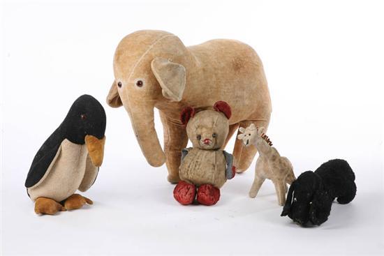 Appraisal: FIVE STUFFED ANIMALS A tan elephant h A black and