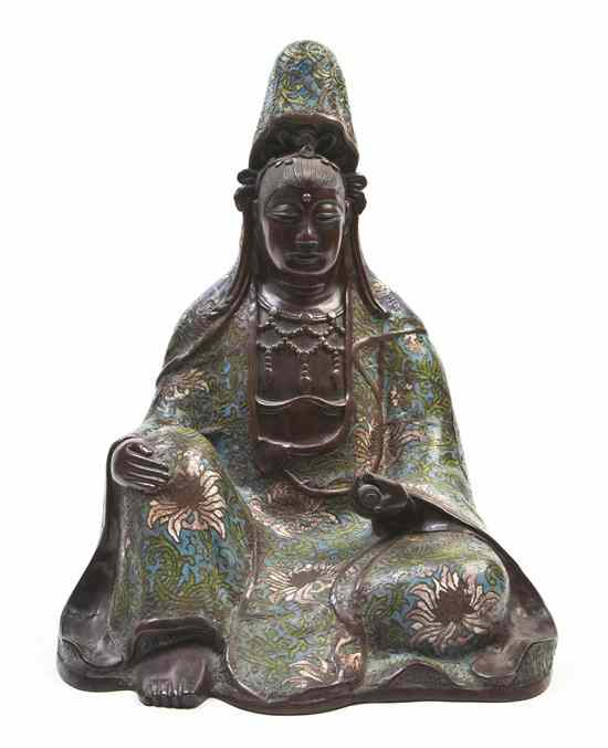 Appraisal: A Cloisonne Decorated Model of Guanyin her robes with lotus