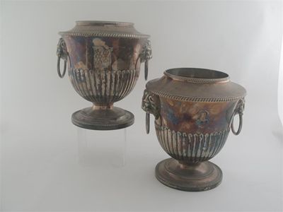 Appraisal: A pair of Old Sheffield plated wine coolers with lion