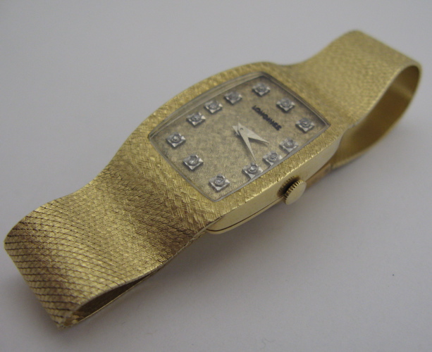 Appraisal: MAN'S LONGINES WRISTWATCH K yellow gold case and integral bracelet