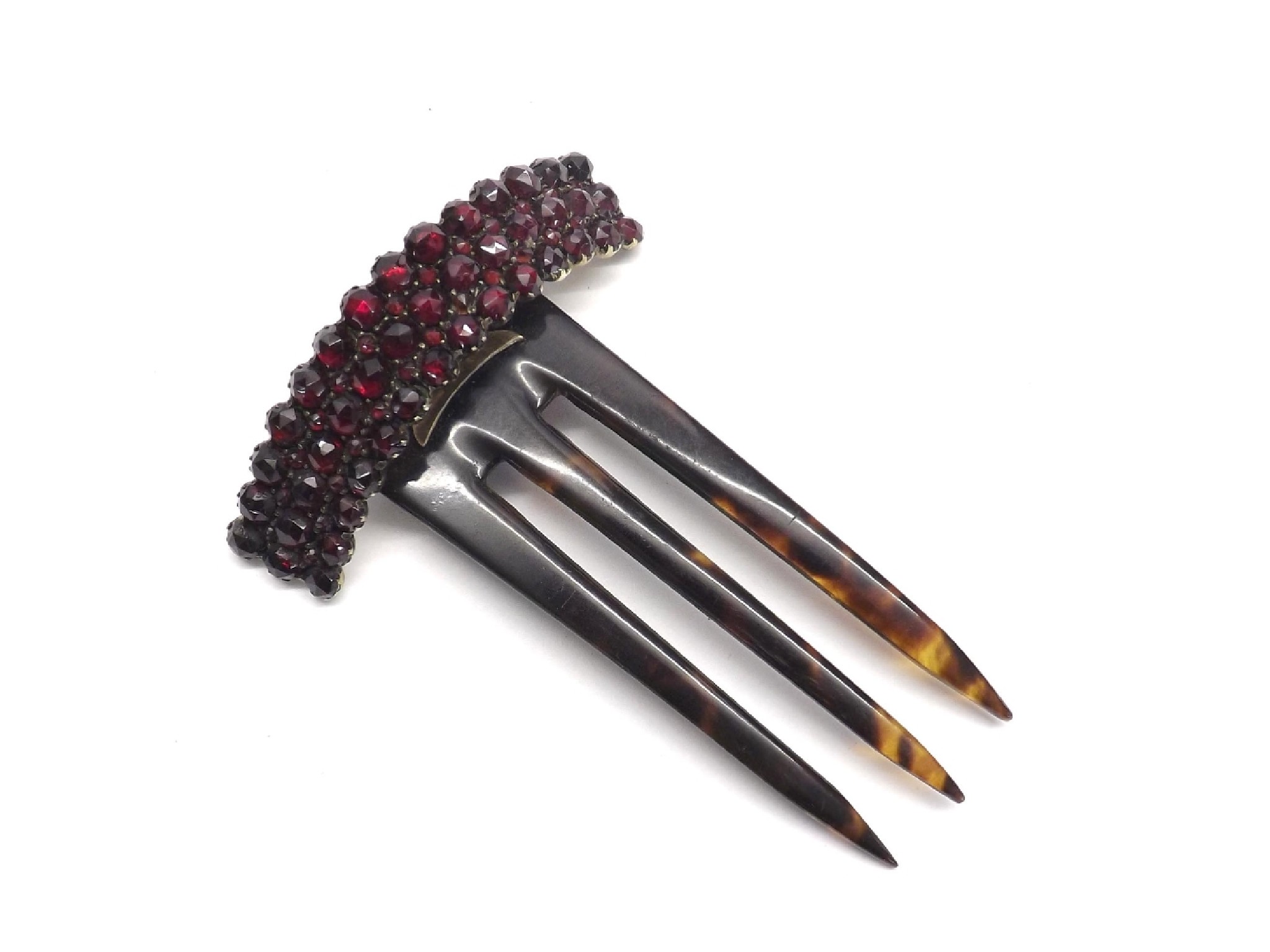 Appraisal: Garnet set tortoiseshell hair comb the garnets set in a