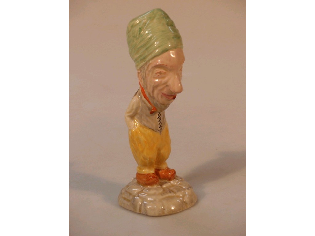 Appraisal: A pottery figure of a bearded Dutch man wearing a