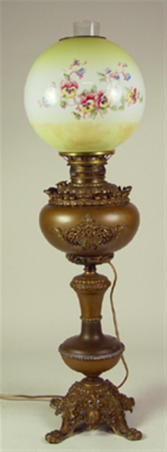 Appraisal: Banquet Lamp Patinated finish electrified burner high with globe shade