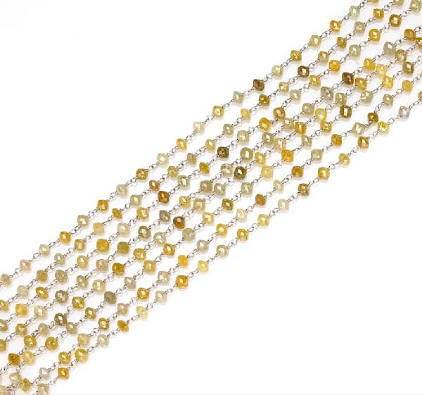 Appraisal: A multi-colored diamond longchain estimated total diamond weight carats mounted