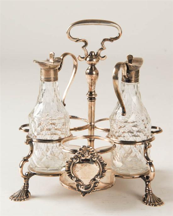 Appraisal: A George III Sterling Cruet Stand with two later cut