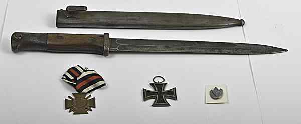 Appraisal: German WWI and WWII Bayonet And Medals German bayonet with