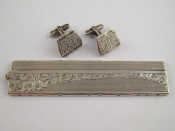 Appraisal: A mixed lot comprising a pair of silver cufflinks and