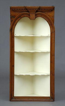 Appraisal: CHIPPENDALE PINE CORNER CABINET The dentil molding with outset center