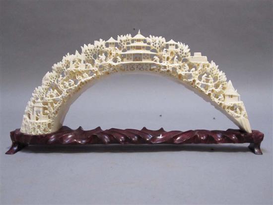 Appraisal: CHINESE CARVED IVORY TUSK BRIDGE th C With openwork carved