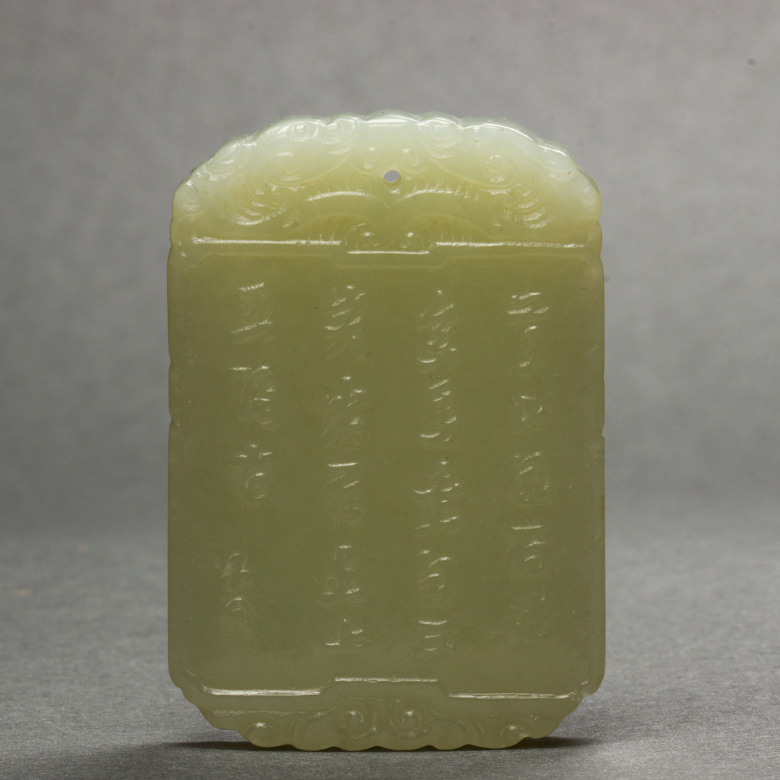 Appraisal: CHINESE CELADON JADE PENDANT PLAQUE Chinese celadon jade pendant plaque