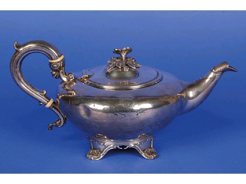 Appraisal: A VICTORIAN TEAPOT of compressed circular form the scroll handle