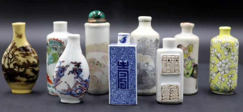 Appraisal: ASSORTED CHINESE PORCELAIN SNUFF BOTTLES Includes a Chinese square blue