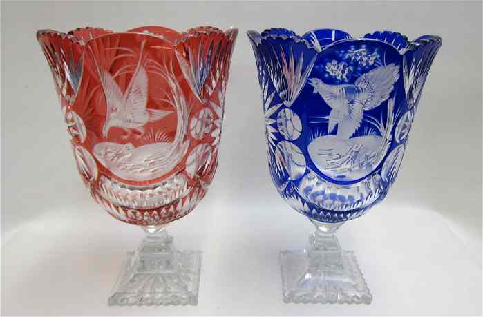 Appraisal: TWO CUT AND COLORED CRYSTAL PEDESTAL VASES flashed and engraved