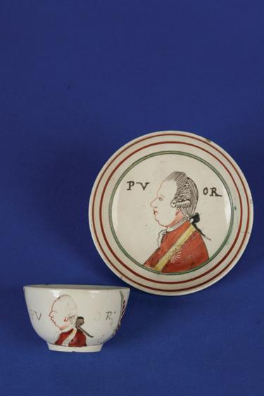 Appraisal: AN TH CENTURY CREAMWARE PLATE painted in polychrome with an