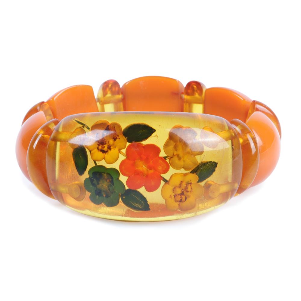 Appraisal: REVERSE CARVED APPLE JUICE BAKELITE STRETCH POLYCHROME PAINTED FLORAL BRACELET