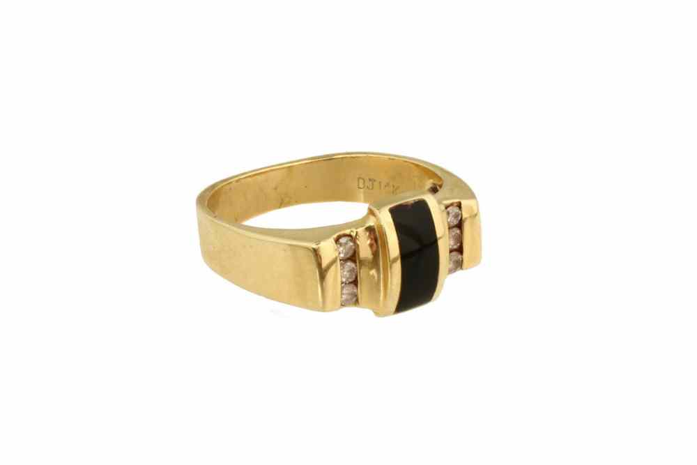 Appraisal: LADY'S RING - One K yellow gold ring channel set