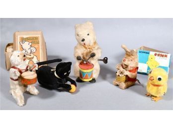 Appraisal: Five Japanese mechanical wind up toys including Drumming bear and