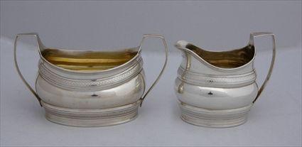 Appraisal: GEORGE III SILVER CREAMER AND SUGAR BOWL Robert David Hennell