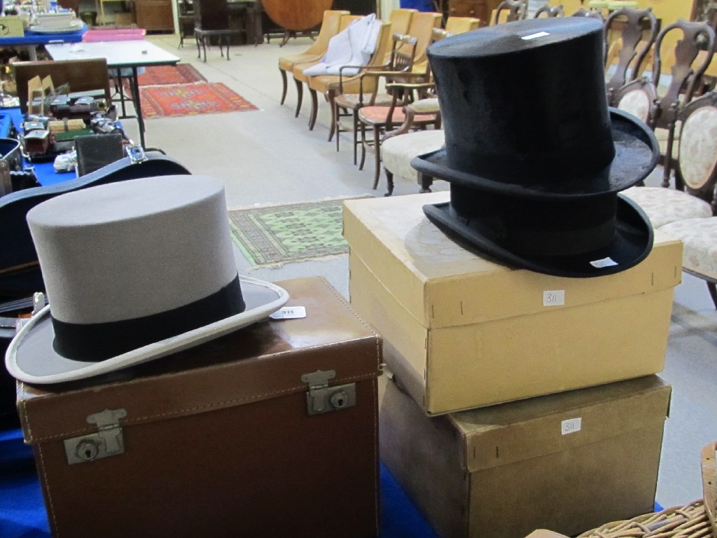 Appraisal: Lot comprising two top hats and a bowler hat with