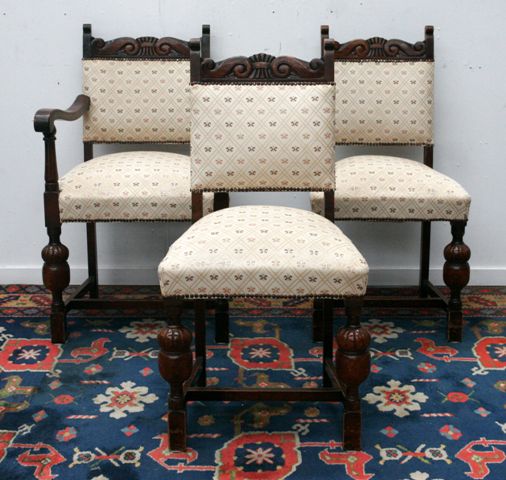 Appraisal: A set of six oak dining chairs including two carvers