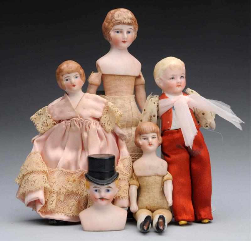 Appraisal: Lot of German Bisque Doll House Dolls Two lady dolls