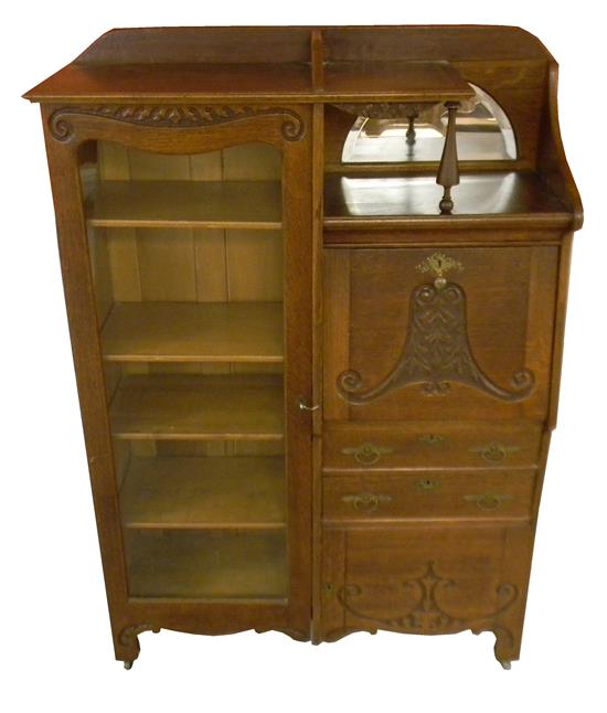 Appraisal: Art Nouveau carved side by side bookcase desk oak with