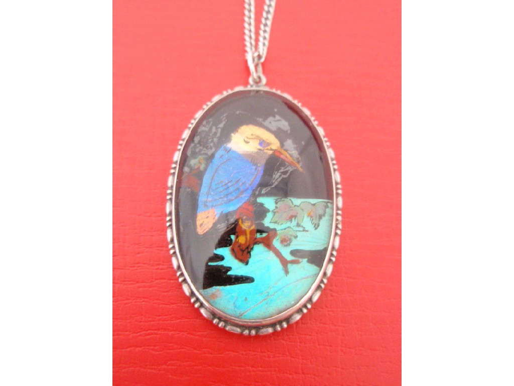 Appraisal: A butterfly wing pendant showing a Kingfisher stamped silver and