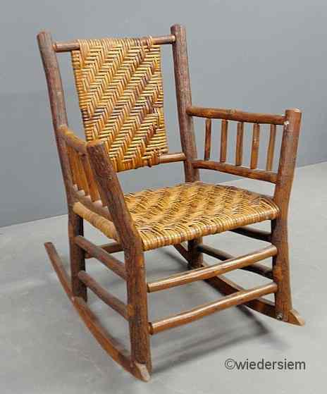 Appraisal: Hickory armchair with a splintwood seat ''h x ''w x