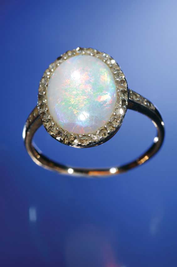 Appraisal: OPAL AND DIAMOND RING Antique opal and diamond ring circa